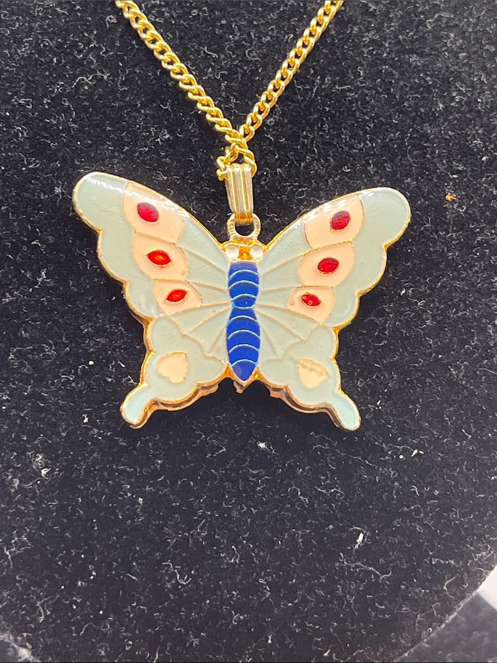 Gold-Tone Butterfly Pendant Necklace in Pale Blue and Red Accents
